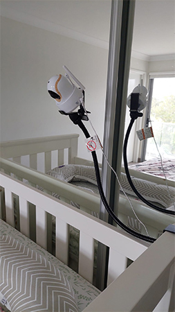 Nannio Comfy Baby Monitor Review - monitor attached to cot
